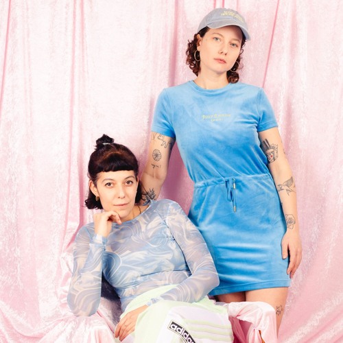 Portrait of 2 Girls 1 Club