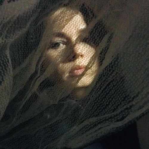Portrait of She's Hearing Voices